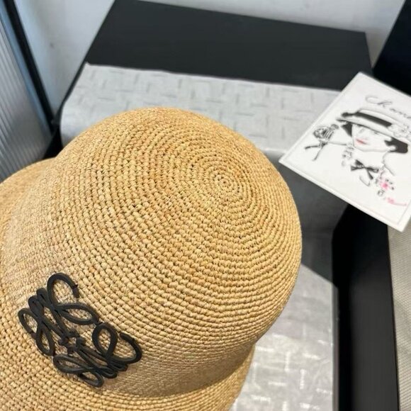 Loewe Tan Straw Hat featuring a black logo